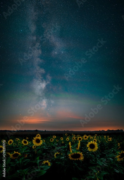 Fototapeta stormy clouds at sunset time