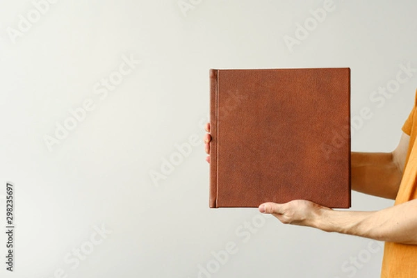 Fototapeta Mock up design templates. photo album in hand