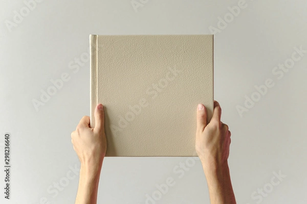 Fototapeta Mock up design templates. photo album in hand