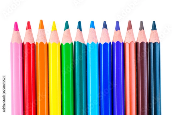 Fototapeta a row of colored pencils sharpened sharply on a white background isolated