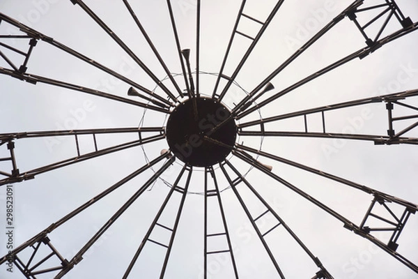 Fototapeta Metallic iron sphere structure. Big building. Rusty beams. Abstract shape symbol.