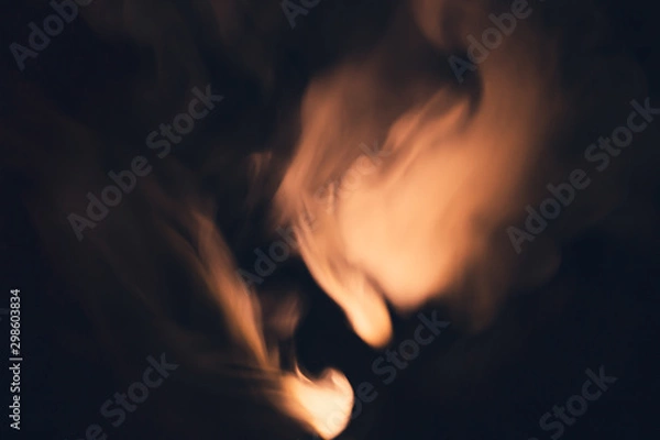 Fototapeta Colored smoke on black backdrop. abstract background with brown fog