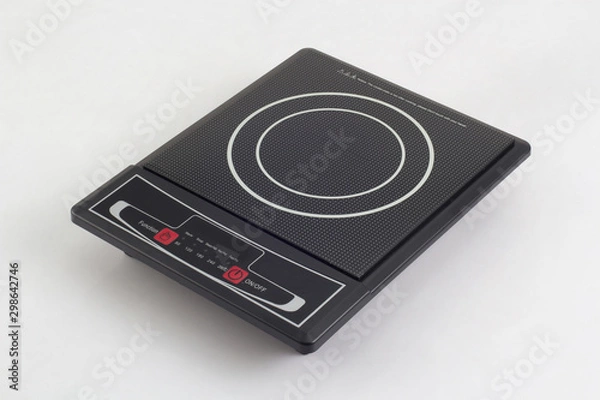 Fototapeta portable induction hob with touchpad isolated on white