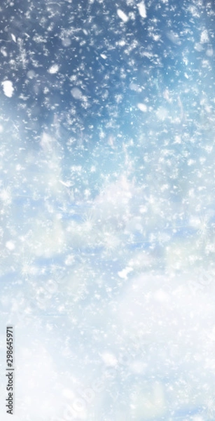 Obraz Abstract winter christmas background with shiny snow and blizzard. Space for text. Vertical for stories