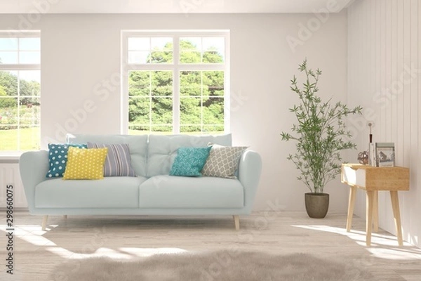 Fototapeta Stylish room in white color with sofa and summer landscape in window. Scandinavian interior design. 3D illustration