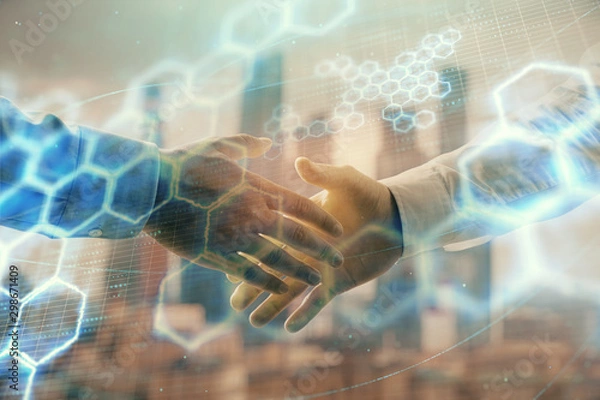 Fototapeta Double exposure of abstract technology drawing on cityscape background with two businessmen handshake. Concept of tech role in business