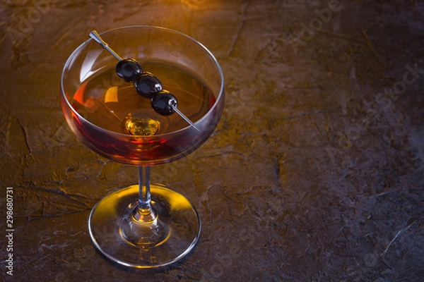 Obraz Manhattan cocktail on fireplace background