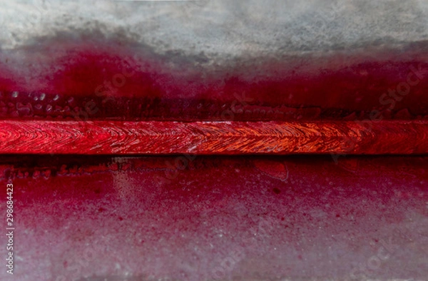 Fototapeta Apply Liquid Penetrant into the welded so that the liquid penetrant into the defect for Non-Destructive Testing(NDT) with process Penetrant Testing(PT).