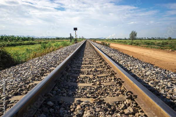 Obraz Photography of railway tracks in a rural scene.
