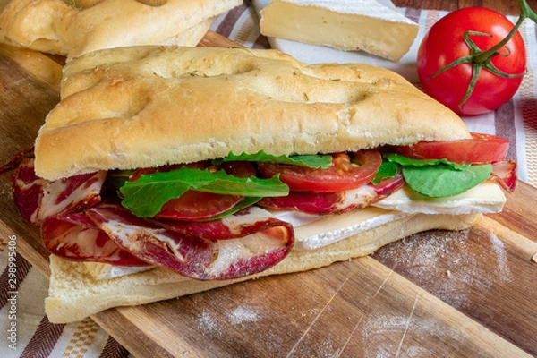 Obraz Italian focaccia sandwich with capocollo, lettuce & tomatoes