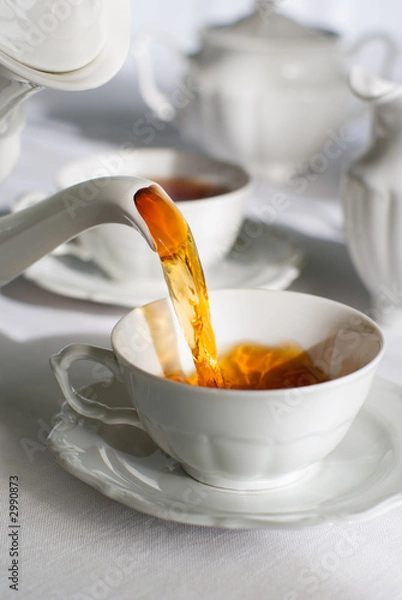 Obraz pouring tea.