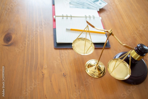 Fototapeta Justice law Scales and books and wooden gavel tool on desk in  Lawyer office.concept