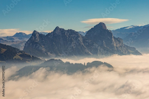 Fototapeta sea of fog and Swiss Mythen mountains in evening sun