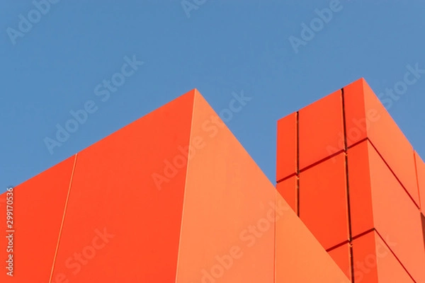 Fototapeta Geometric colored building facade elements with planes, lines and corners with light flare and reflections for an abstract background and texture of white, blue, gray colors. Place for text