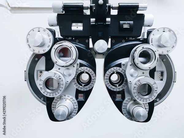 Fototapeta phoropter close up view of ophthalmology, optometry, and optician clinical testing machine equipment