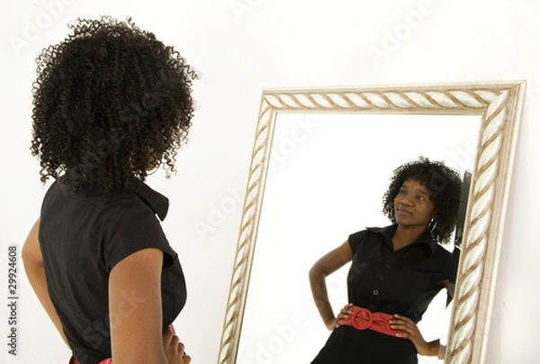 Obraz Lady looking at herself in mirror smiling