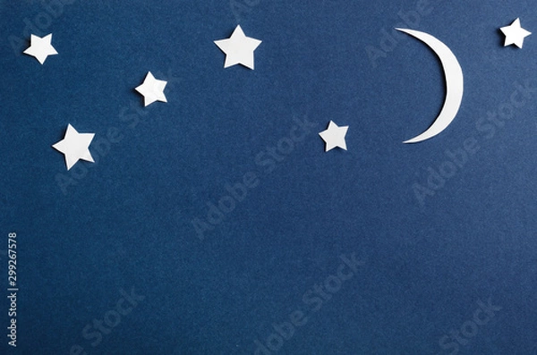 Obraz Moon and stars on blue background top view. Night sky objects with shadow close up. Decorative backdrop. Childish applique, homemade postcard. Starry heaven. Kid bedtime, nighttime concept.