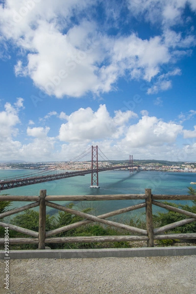 Fototapeta Stunning pictures of the Ponte 25 de Abril bridge - Over 2km-long, this striking Golden Gate-style bridge links Lisbon with Almada in Portugal. 