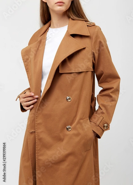 Obraz Female trench coat camel color isolated on white background.