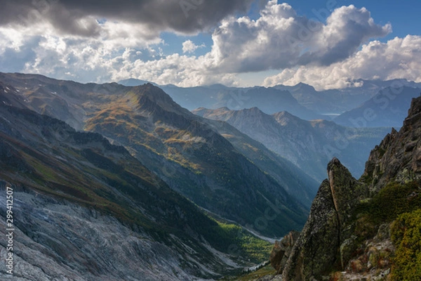Fototapeta Wonderful views of the mountains in the Swiss Alps with backpackers.