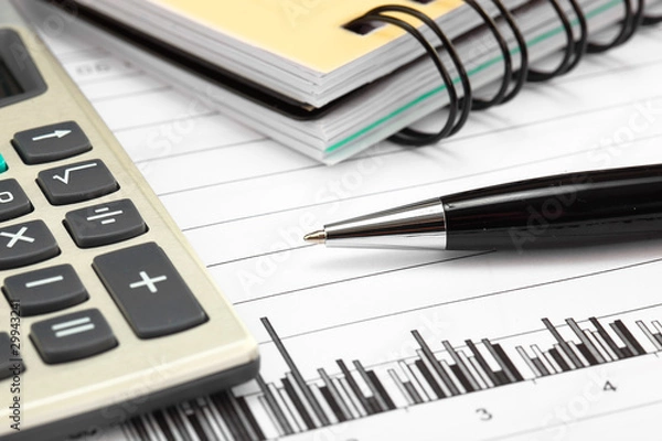 Fototapeta financial charts and graphs on the table