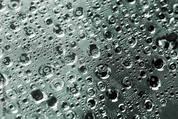 Fototapeta water drops on a metal surface