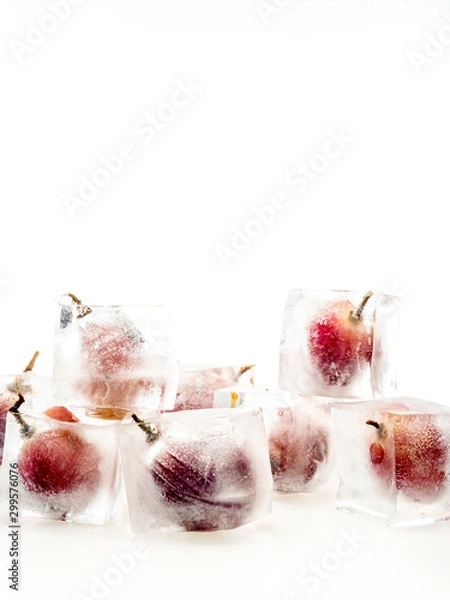 Obraz Grape inside ice on white background