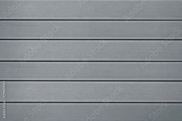 Fototapeta Top view of WPC in grey color. WPC: Wood-Plastic Composites are wood fiber and thermoplastic such as PE, PP, PVC, or PLA. A WPC decking are stylish and enrich the outdoor living