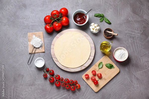 Fototapeta Flat lay composition with fresh ingredients for pizza Margherita on grey table