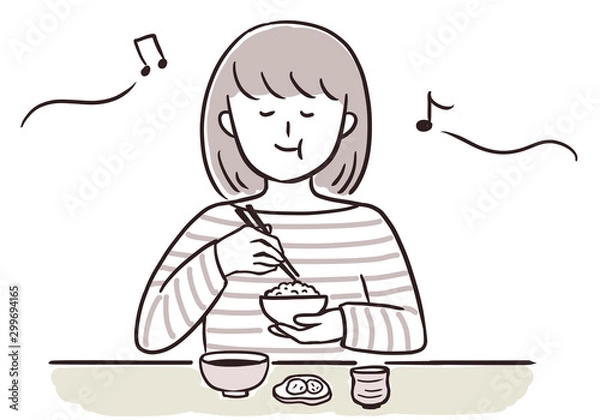 Obraz 音楽を聞きながら食事をする女性