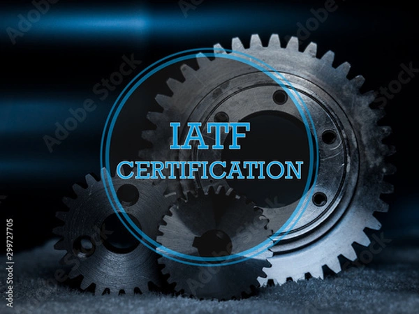 Obraz IATF Certification Logo in blau mit Industrie Hintergrund