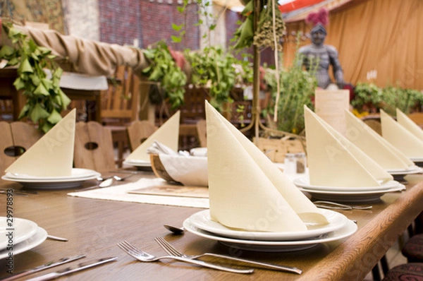 Fototapeta Restaurant table spread in middleage style