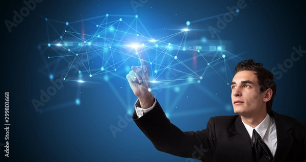 Fototapeta Man touching hologram screen displaying modern web system