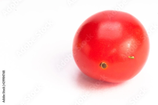 Obraz Single small red tomatoe on isolating background