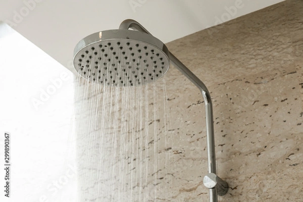 Fototapeta Close up of water shower faucet in the bathroom.