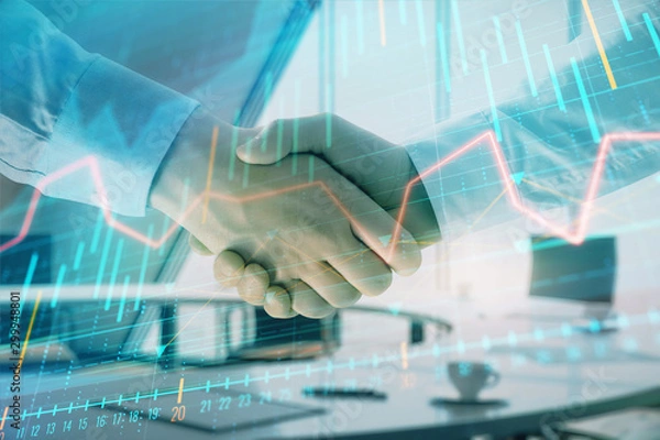 Fototapeta Multi exposure of financial graph on office background with two businessmen handshake. Concept of success in business