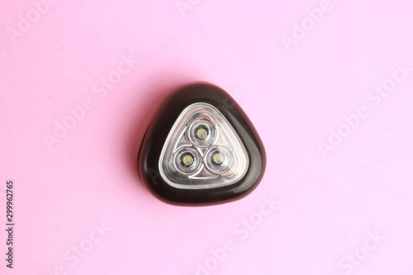 Fototapeta triangular black flashlight led light