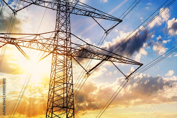 Obraz Hochspannungs - Strommast und Sonne 