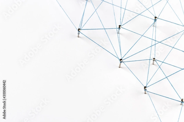 Obraz A large grid of pins connected with string. Communication, technology, network concept. Network with pinsA large grid of pins connected with string. Communication, technology, network concept. 