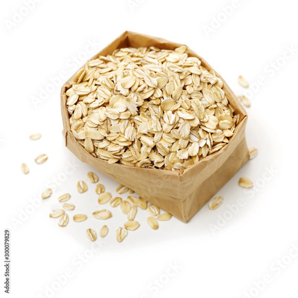 Obraz Oat flakes pile on white background 