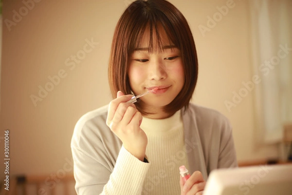 Fototapeta 化粧する女性