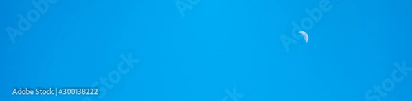 Fototapeta blue sky with moon using as background cover page concept.