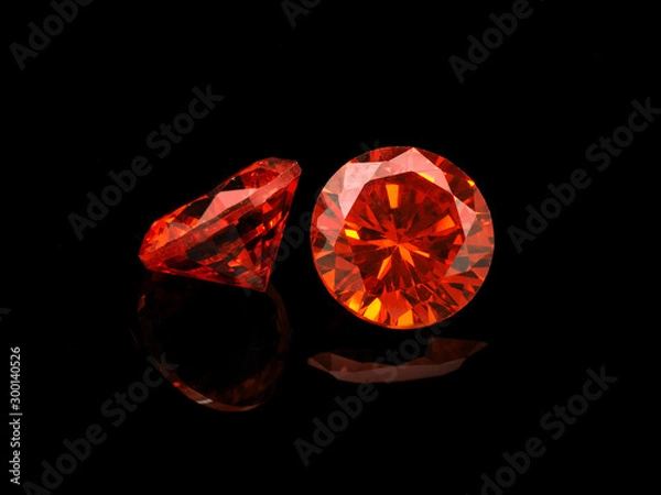 Obraz Light Red Gemstone on a Black Background
