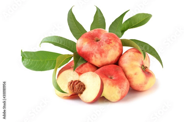 Fototapeta Flat fig peaches with a half and with leaves isolated on white