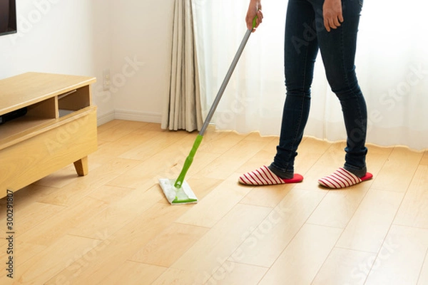 Obraz 床掃除をする女性