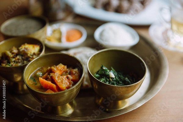 Obraz Set menu of different curry in Nepalese cafe