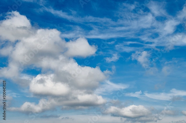 Fototapeta Huge clouds in the blue sky as background