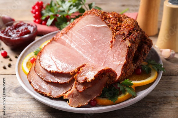 Obraz Delicious ham served with garnish on wooden table