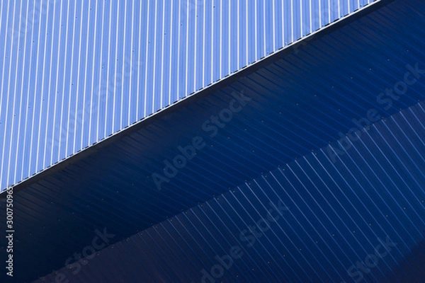 Obraz Geometric colored building facade elements with planes, lines and corners with light flare and reflections for an abstract background and texture of white, blue, gray colors. Place for text