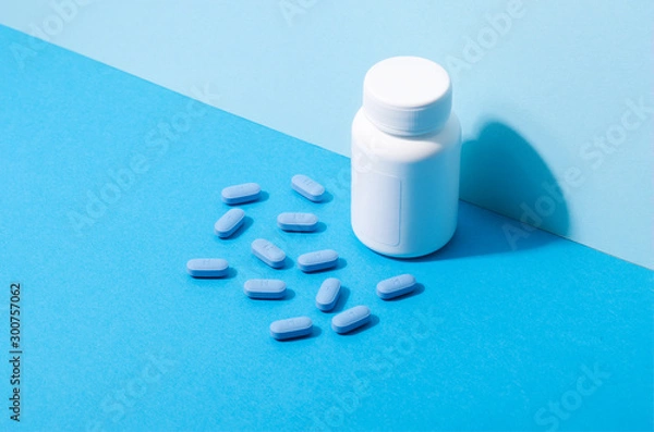 Fototapeta Open bottle of prescription PrEP Pills for Pre-Exposure Prophylaxis to help protect people from HIV..